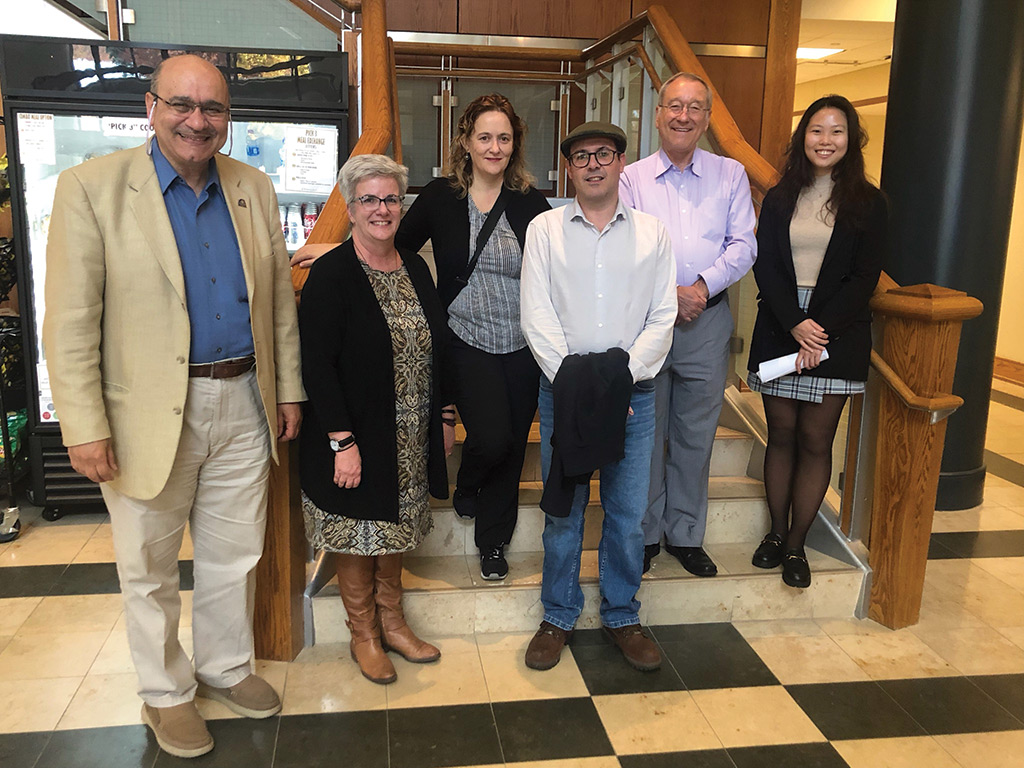 Photo courtesy of Jana Jaffa, Director International Student and Scholar Services Provost Lauren Bowen, second from the left, welcomed visiting scholars and their family members in the fall of 2022, including, from the left, Amr Abdalla, Belen Garcia Balbontin, Carlos Sanchez-Fernandez, Hermann Buettner, and Jou Li. 