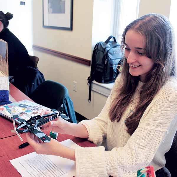 Madison Seipp ’26 creates a model of the Spitfire, a World War II airplane